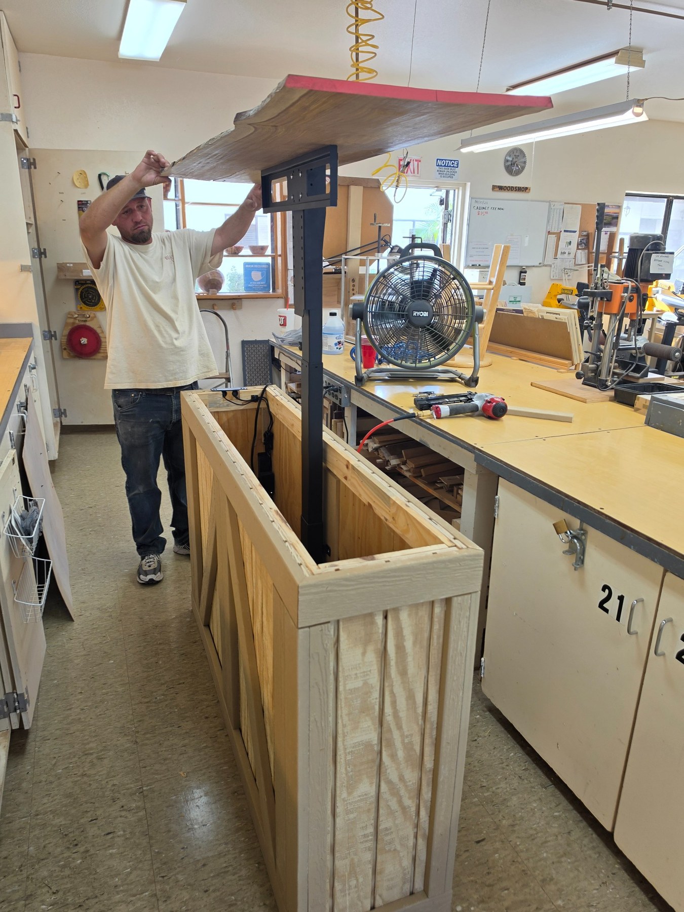 Fitting the live edge top to the TV lift cabinet
