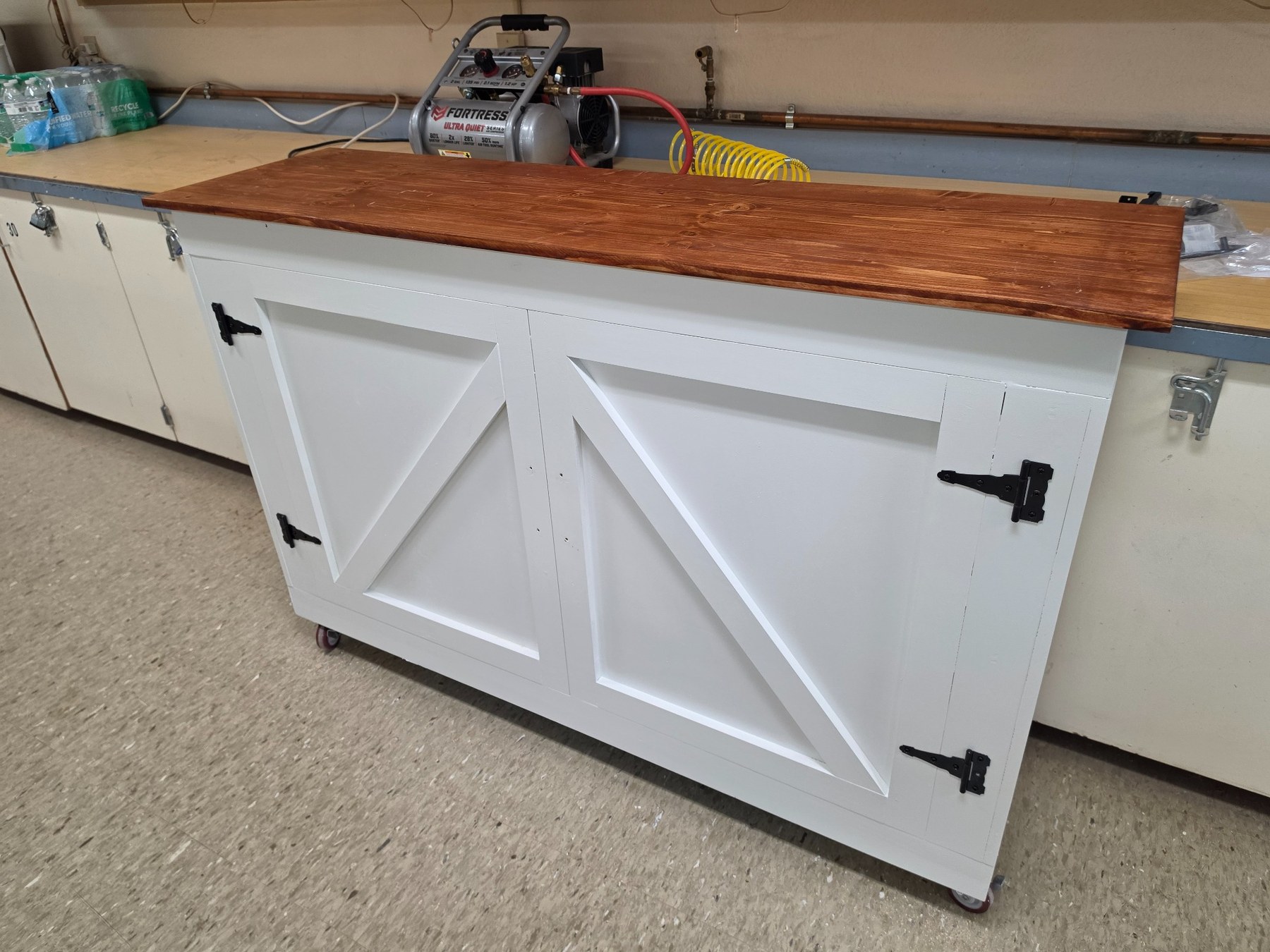 White cabinet with stained wood top
